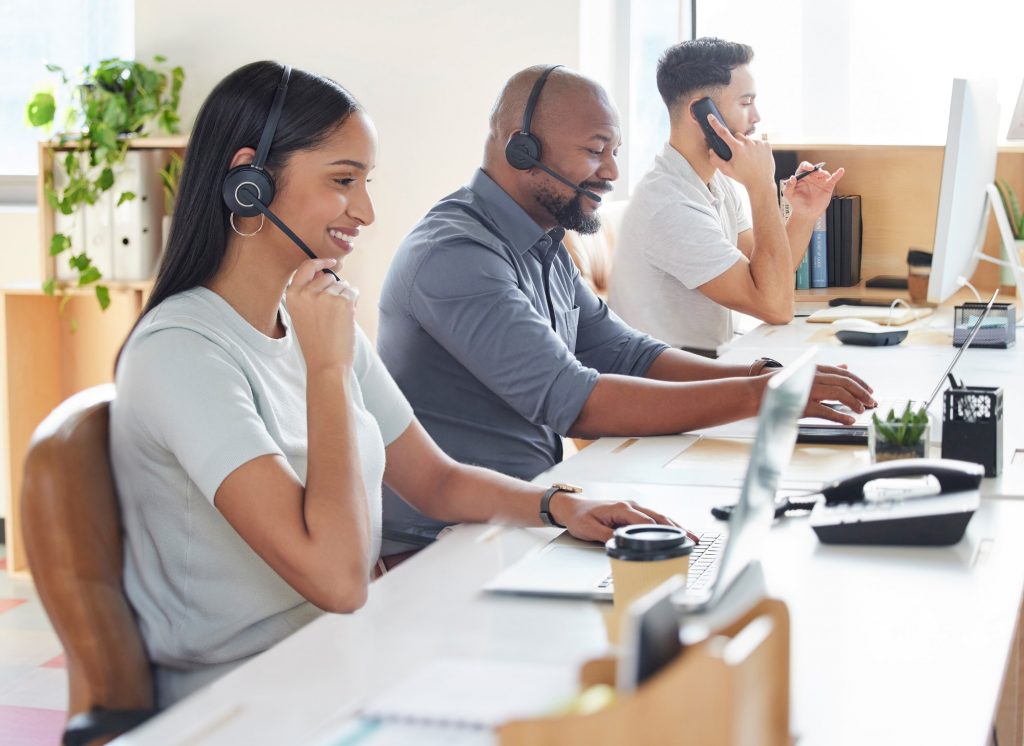 Shot of a group of businesspeople working in a call centre